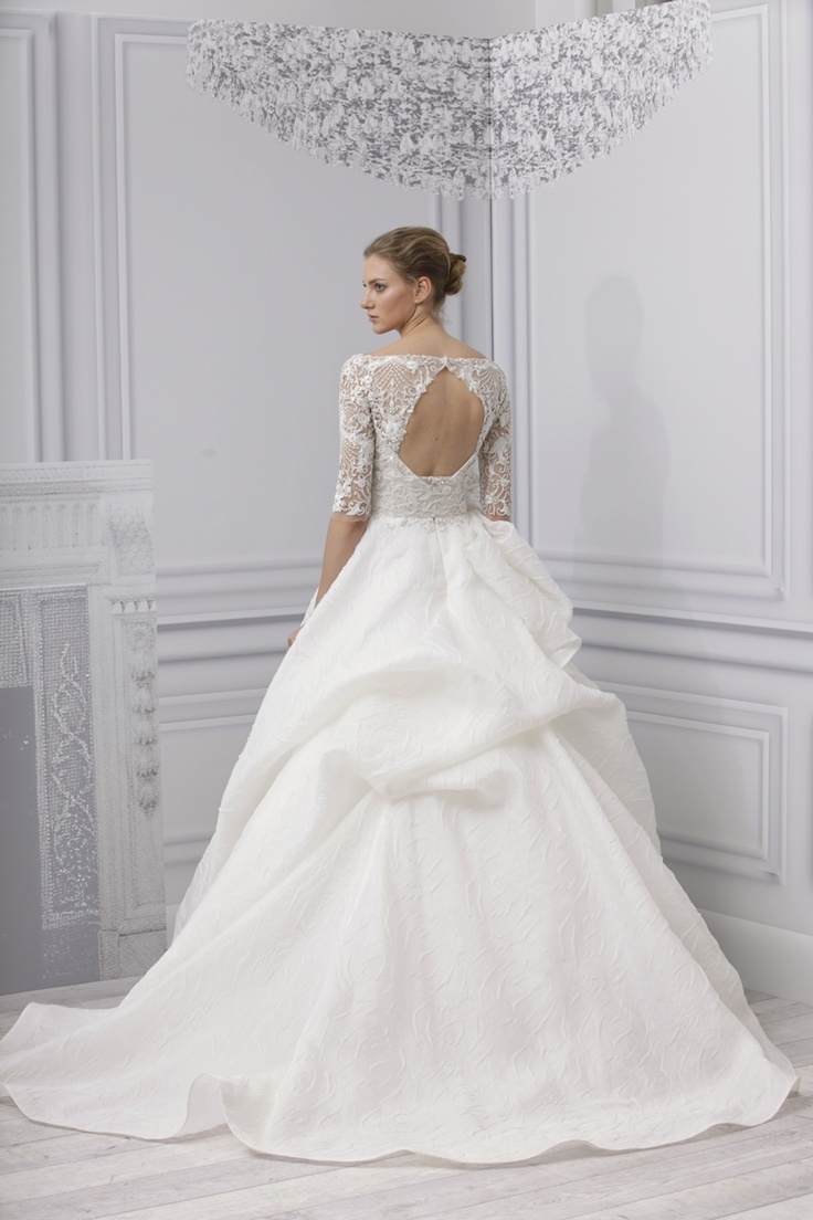 The Wedding Dress With A Dramatic Back Arabia Weddings