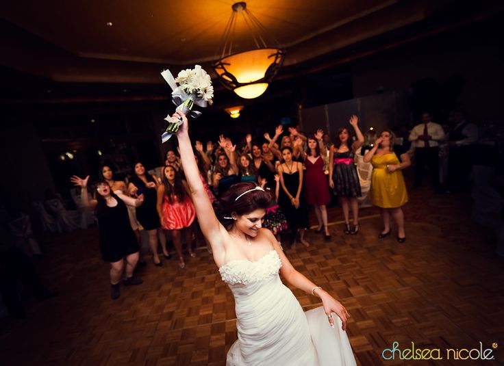 The Real Reason Behind The Traditional Bouquet Toss 