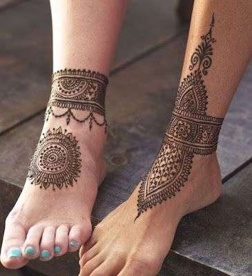 Henna tattoo on the foot palolem beach of south goa india   CanStock