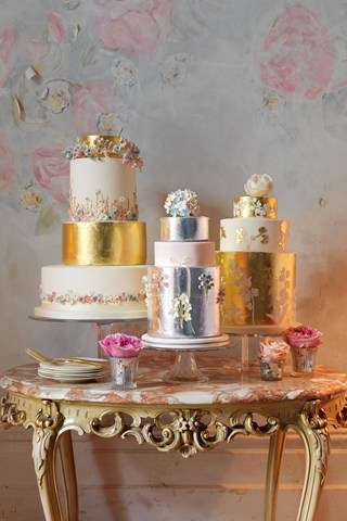 Vertical closeup of the wedding cakes with beautiful decorations Stock  Photo - Alamy